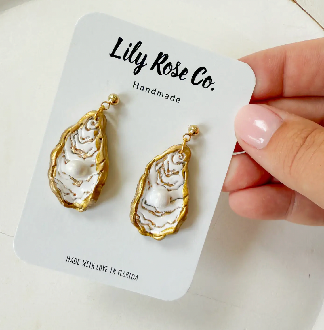 OYSTER EARRINGS