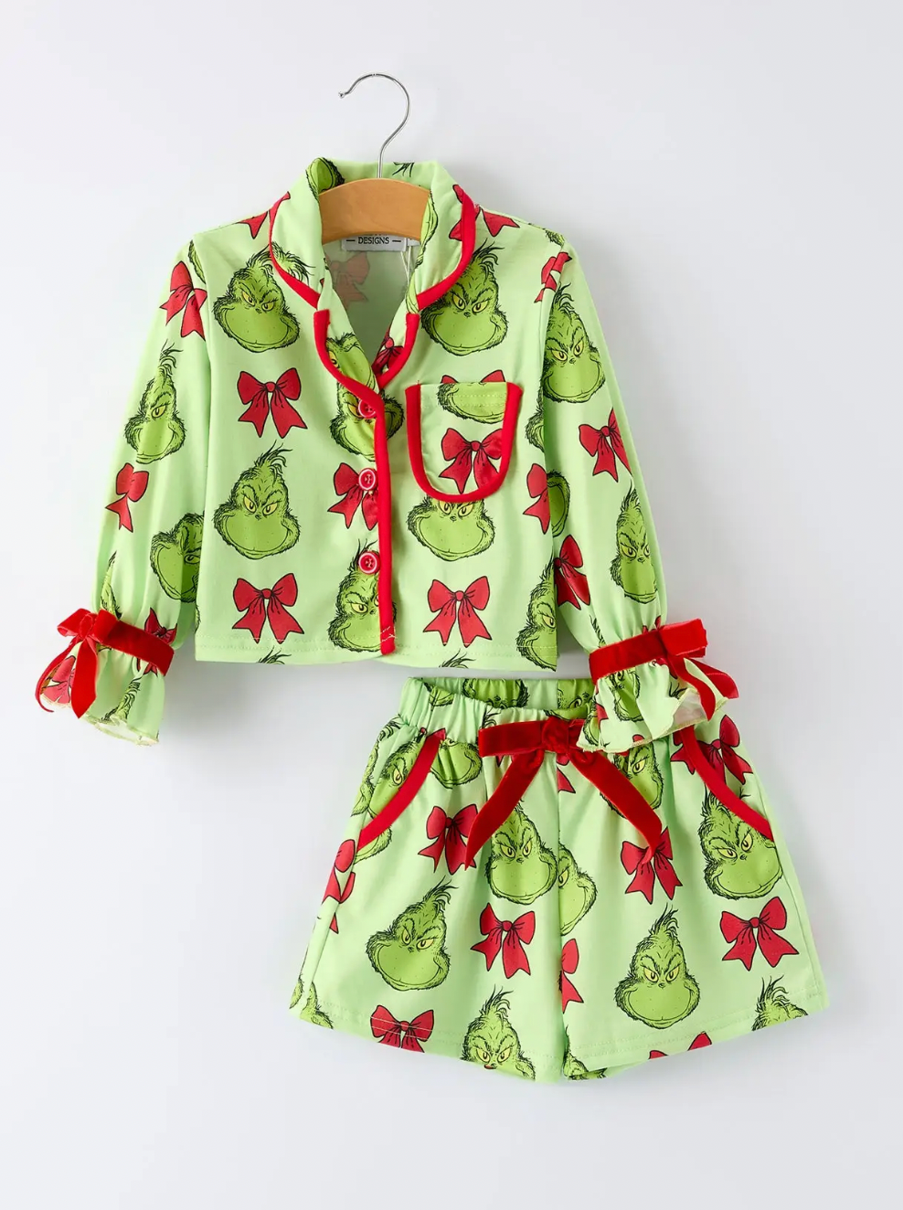 KIDS GREEN CHRISTMAS CHARACTER BOW PRINT PAJAMAS