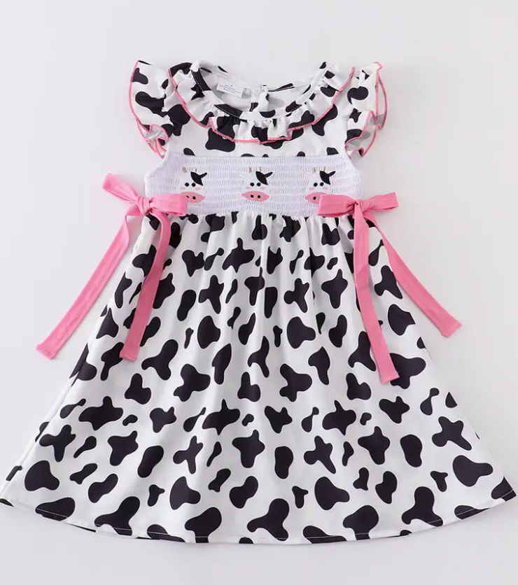 COW PRINT SMOCKED RUFFLE DRESS