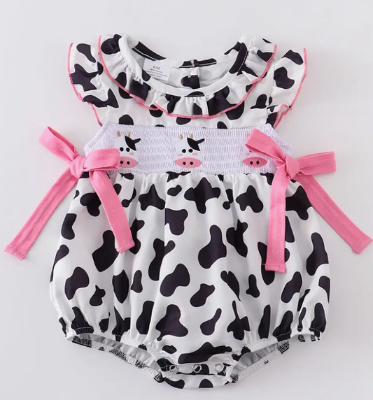 COW PRINT SMOCKED RUFFLE GIRL ROMPER