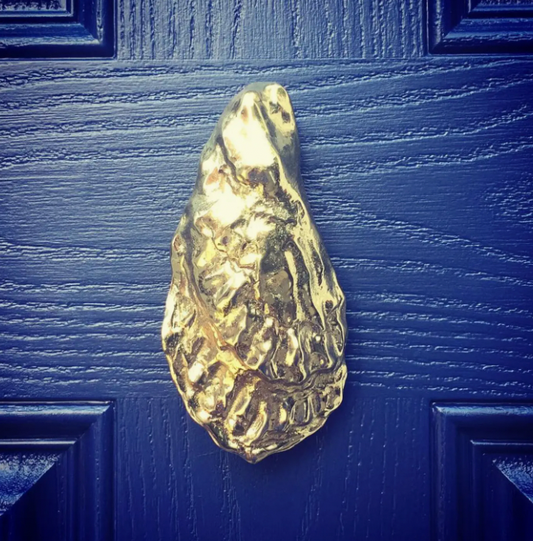 OYSTER DOOR KNOCKER POLISHED BRASS