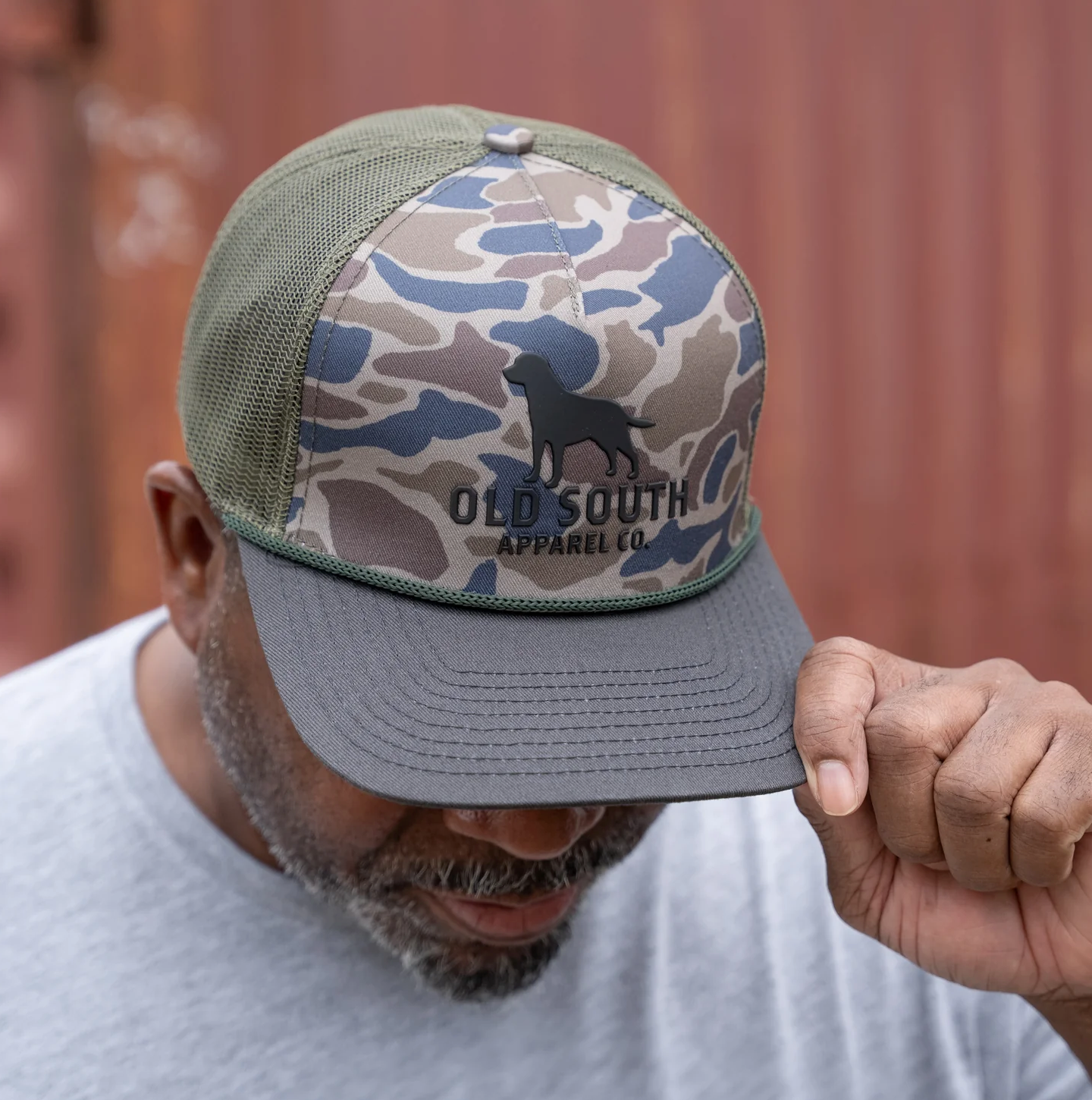 BURLEBO DOG OUTLINE WITH THICKET CAMO TRUCKER HAT MOSS GREEN