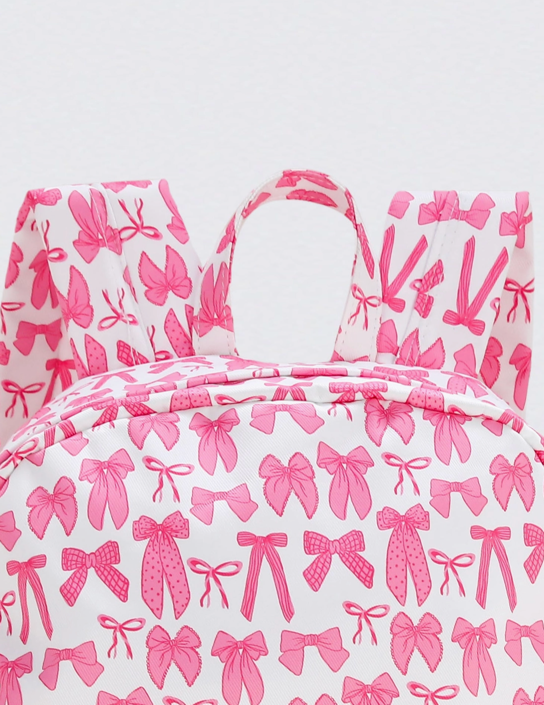 BOW PRINT GIRLS CANVAS BACKPACK