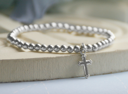CHILD STERLING SILVER BEAD 5" STRETCH BRACELET WITH CROSS